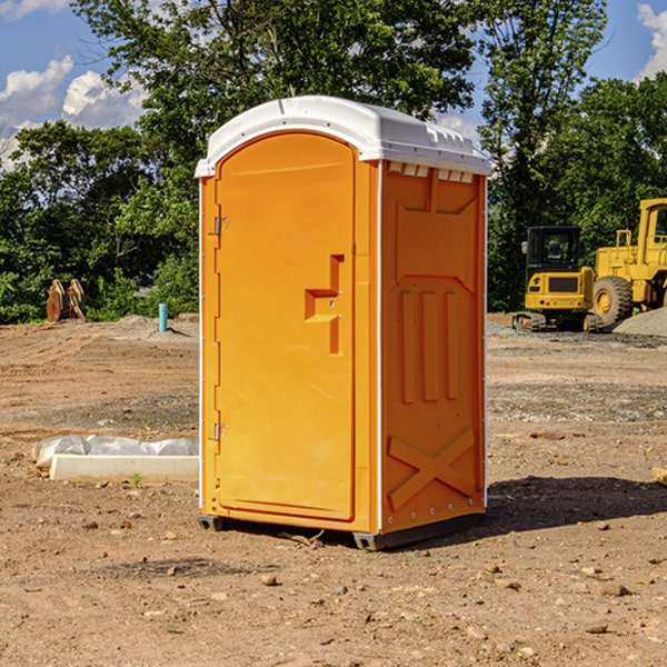 how often are the portable toilets cleaned and serviced during a rental period in Delshire